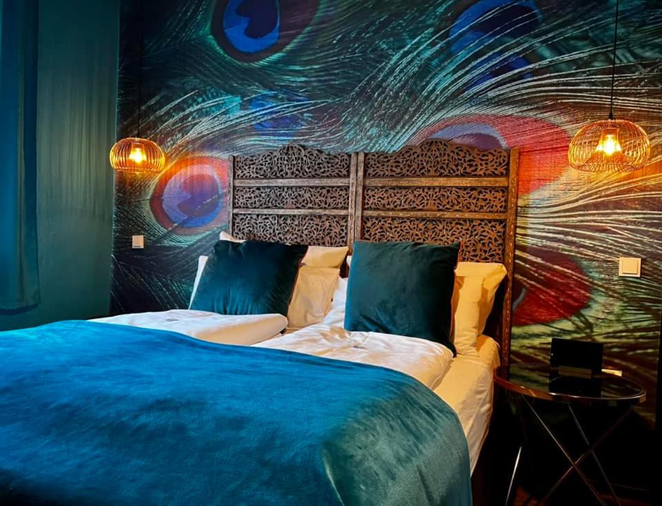 Postel nebo postele na pokoji v ubytování Boutique Hotel & Bio Wirtshaus Schwarzer Bock