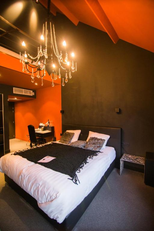 Postel nebo postele na pokoji v ubytování Hotel Moon