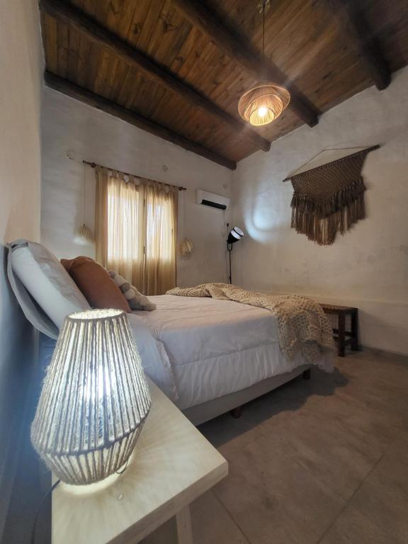 Postel nebo postele na pokoji v ubytování El Vigía del Valle