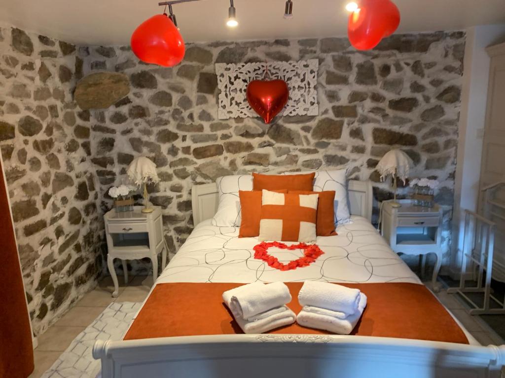 Postel nebo postele na pokoji v ubytování Petit coin de paradis