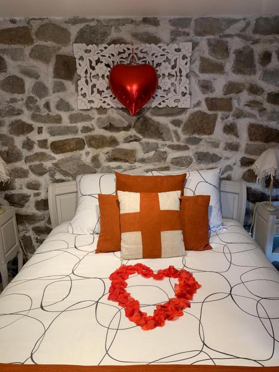 Postel nebo postele na pokoji v ubytování Petit coin de paradis