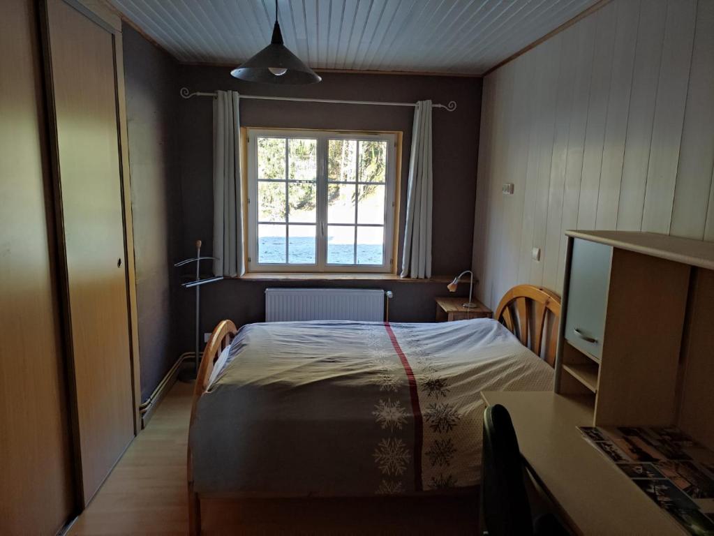 Postel nebo postele na pokoji v ubytování Les Lodges Du Pavillon F2