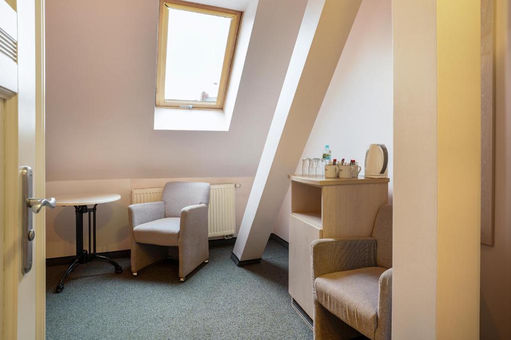 Posezení v ubytování Hotel Amalia