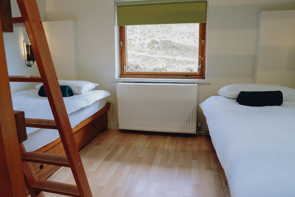 Postel nebo postele na pokoji v ubytování IOU Hebden Bridge Vegetarian Hostel