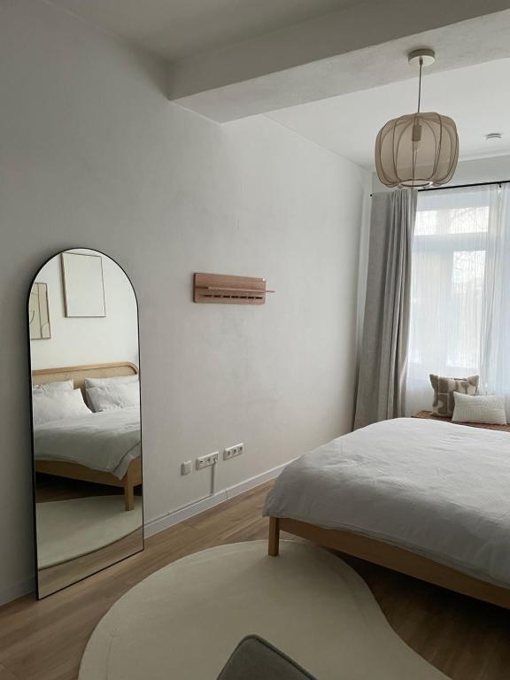 Postel nebo postele na pokoji v ubytování ApartNaest - vollausgestattete Apartments I kostenlos parken I flexibler Check-in I 1 bis 4 Zimmer I 1 bis 10 Personen