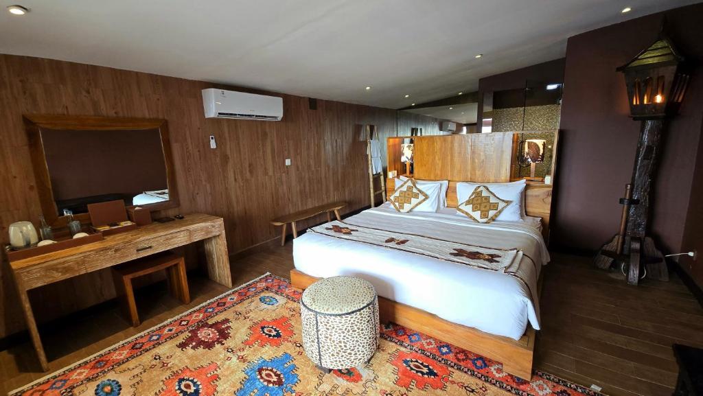 Postel nebo postele na pokoji v ubytování Sky Suites