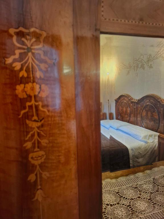 Postel nebo postele na pokoji v ubytování B&B La Veranda - Iseo
