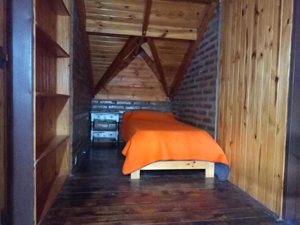 En eller flere senge i et værelse på Complejo Aguador Sur