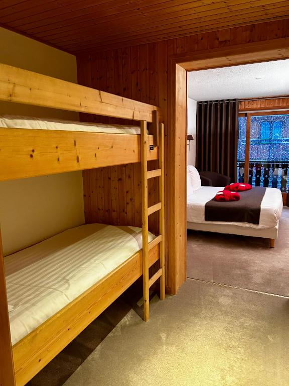 Postel nebo postele na pokoji v ubytování Hotel Bel'alpe