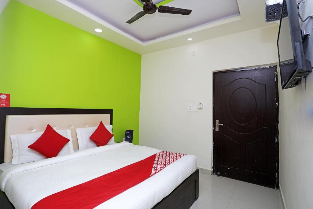 Katil atau katil-katil dalam bilik di Hotel O Raj Palace
