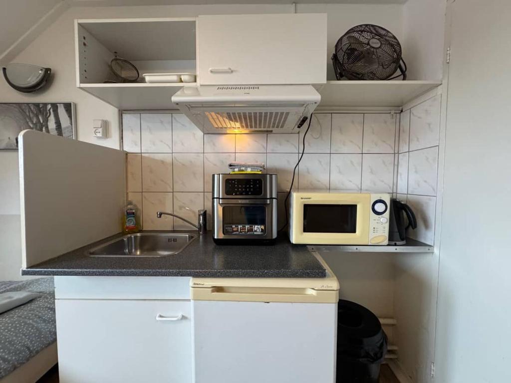 Kuchyň nebo kuchyňský kout v ubytování Bed & Breakfast Vlissingen