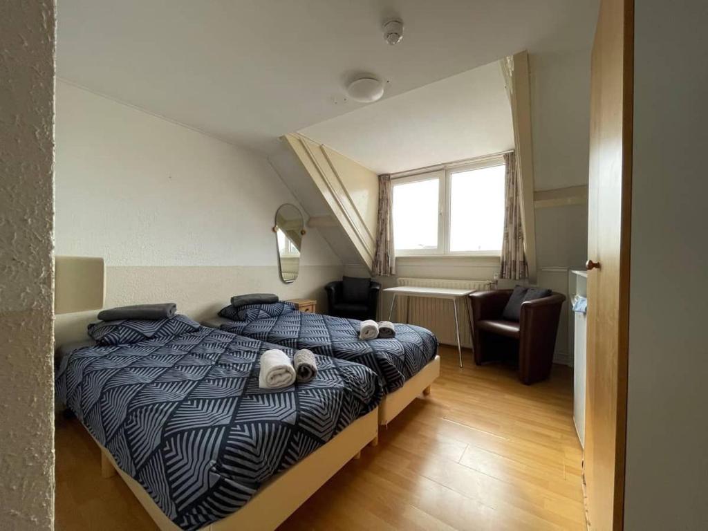 Postel nebo postele na pokoji v ubytování Bed & Breakfast Vlissingen