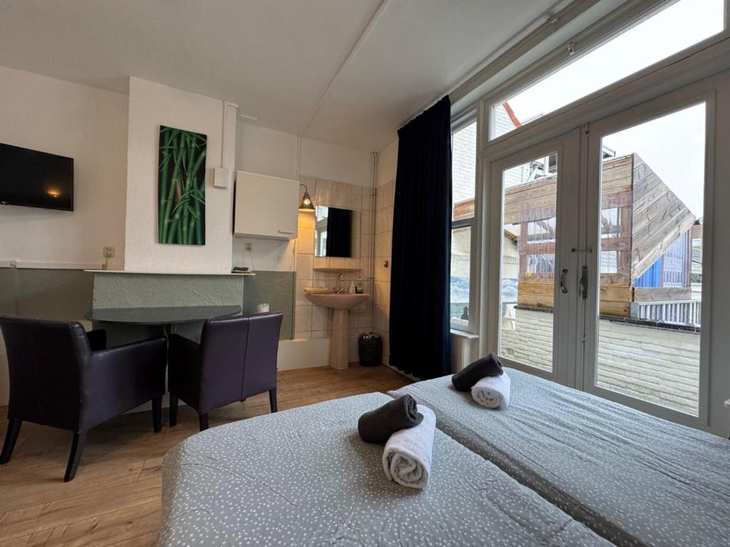 Postel nebo postele na pokoji v ubytování Bed & Breakfast Vlissingen
