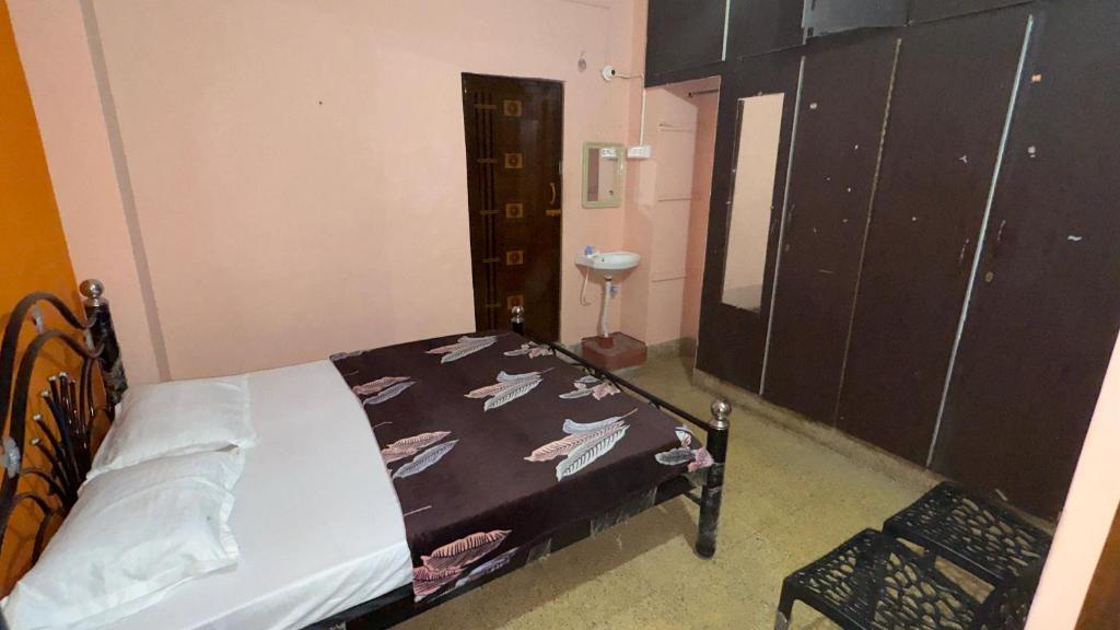 Postel nebo postele na pokoji v ubytování StayIn-SGH