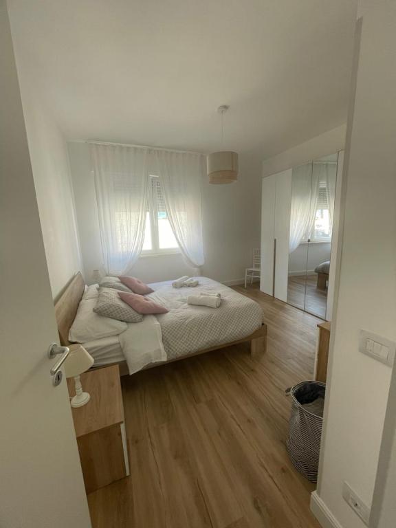 Postel nebo postele na pokoji v ubytování La Casa di Ary