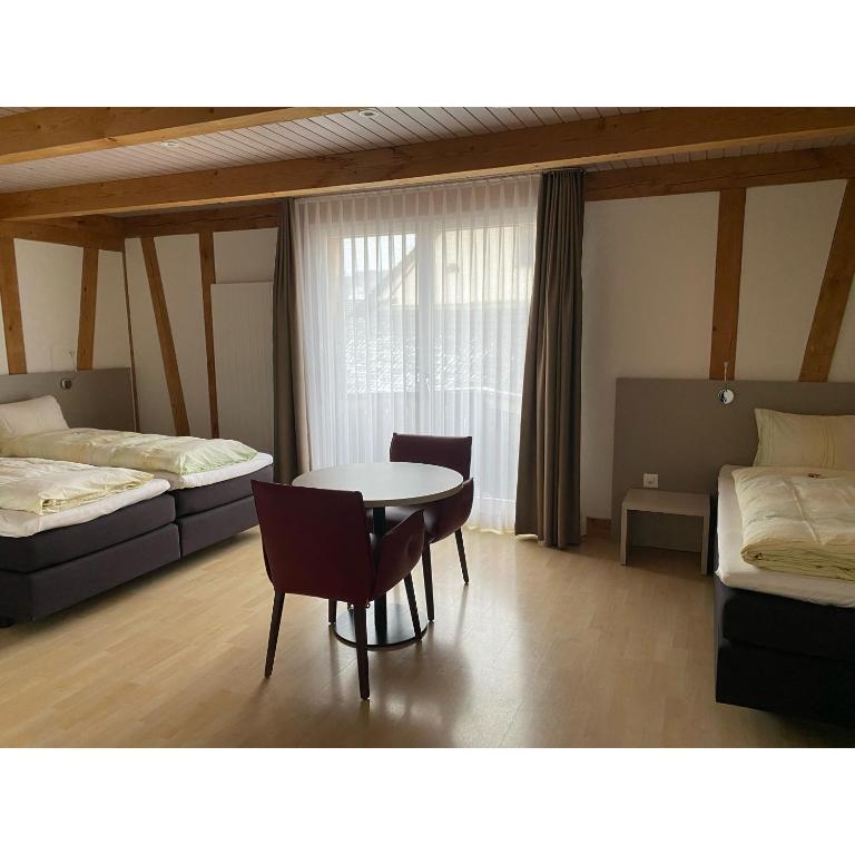 Postel nebo postele na pokoji v ubytování Hotel Gasthaus Hirschen