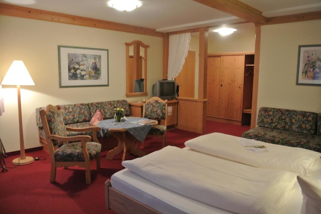 Postel nebo postele na pokoji v ubytování AKZENT Hotel Am Bach