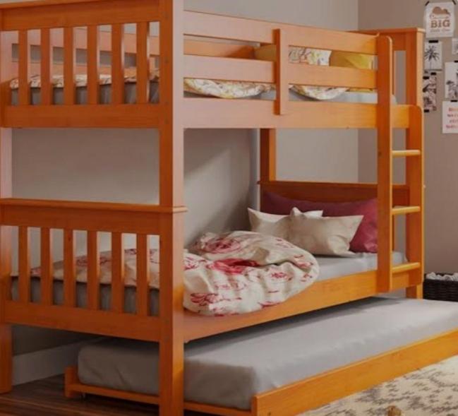 Giường trong phòng chung tại Lar da Tia BAIANA