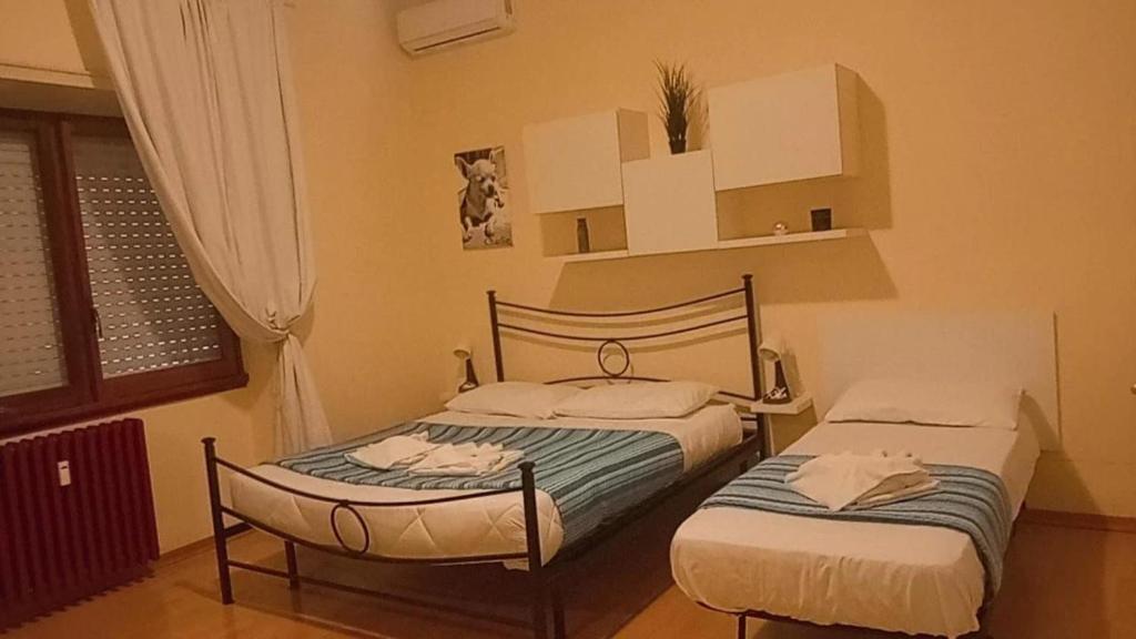 Katil atau katil-katil dalam bilik di Casa Gemelli Gemelli