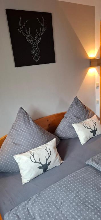 Postel nebo postele na pokoji v ubytování Ferienwohnung Ambiente