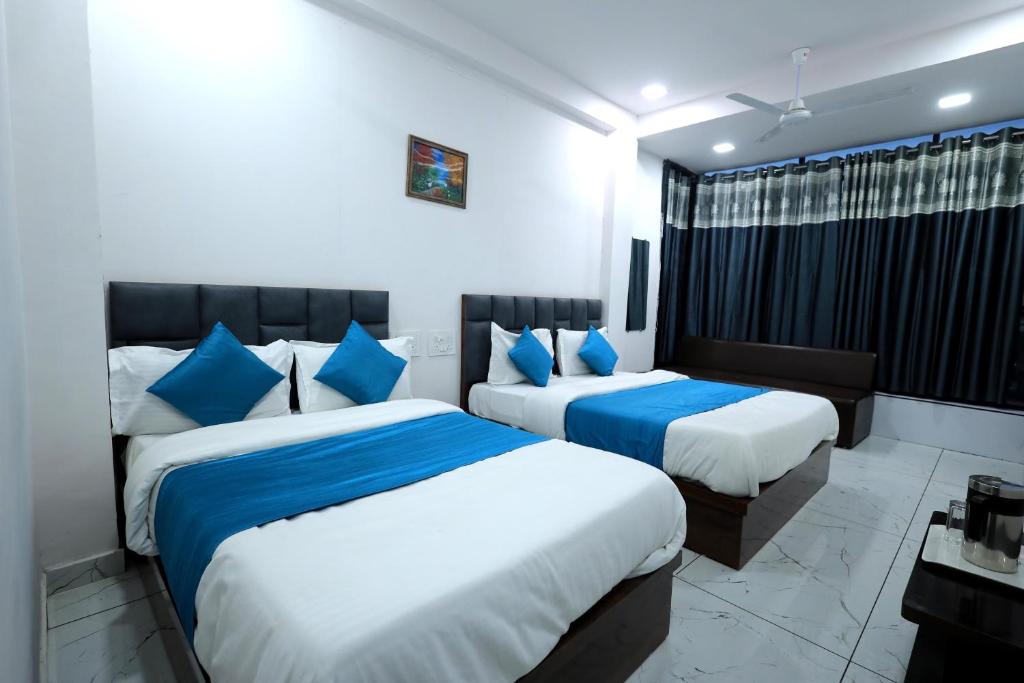 Postel nebo postele na pokoji v ubytování Hotel Season