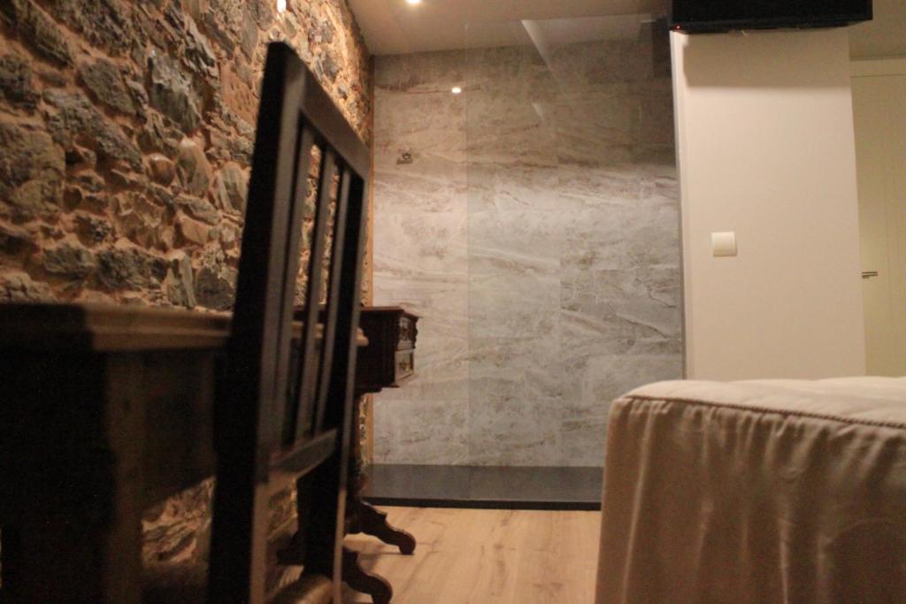 TV a/nebo společenská místnost v ubytování Hostal Siglo XIX