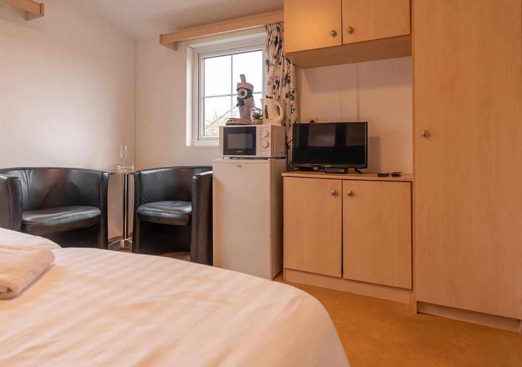 Kuchyň nebo kuchyňský kout v ubytování Chaletparc Krabbenkreek Zeeland - Hotel rooms "Terra Mare"