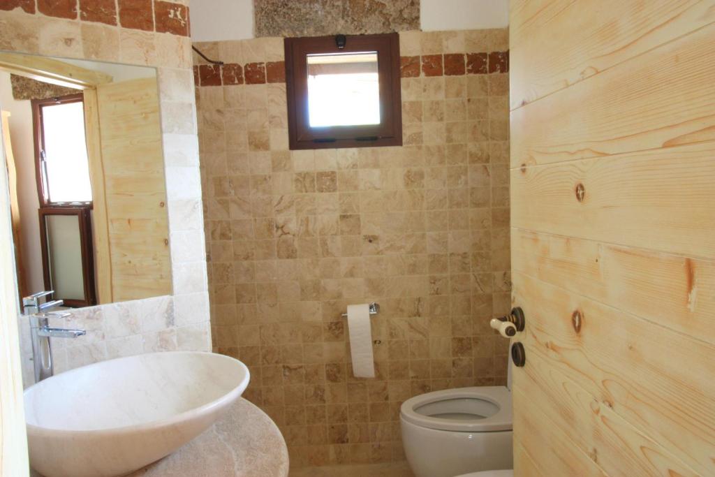 Koupelna v ubytování trullo macchie