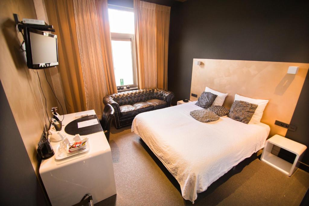 Postel nebo postele na pokoji v ubytování Hotel Moon