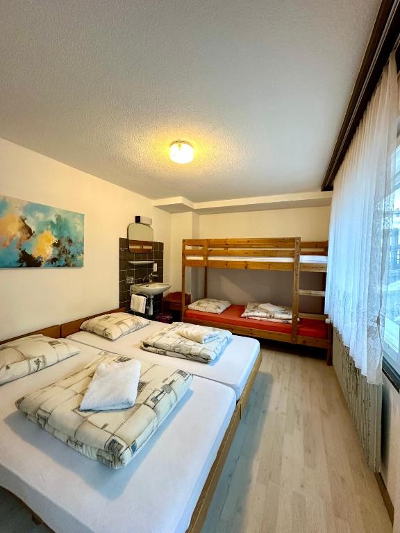 Voodi või voodid majutusasutuse Holiday House Lärchenheim toas