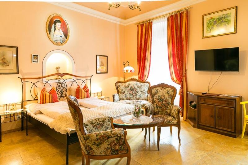 Televízia a/alebo spoločenská miestnosť v ubytovaní Boutique Hotel Ur-Wachau