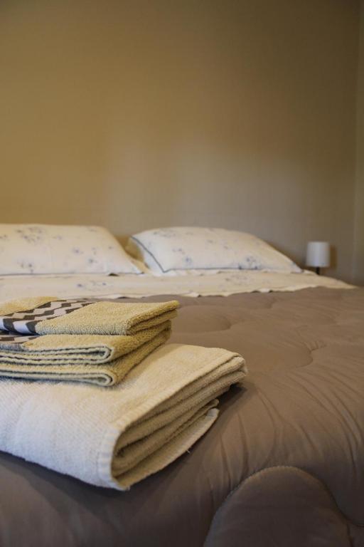 Postel nebo postele na pokoji v ubytování B&B Orchidea Bianca