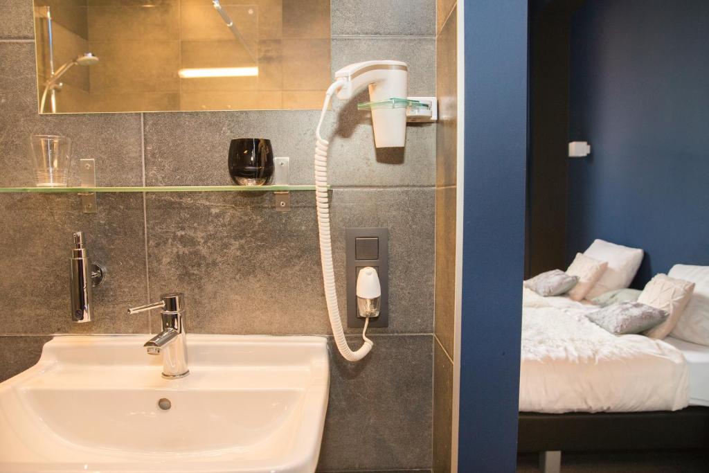 Koupelna v ubytování Hotel Moon