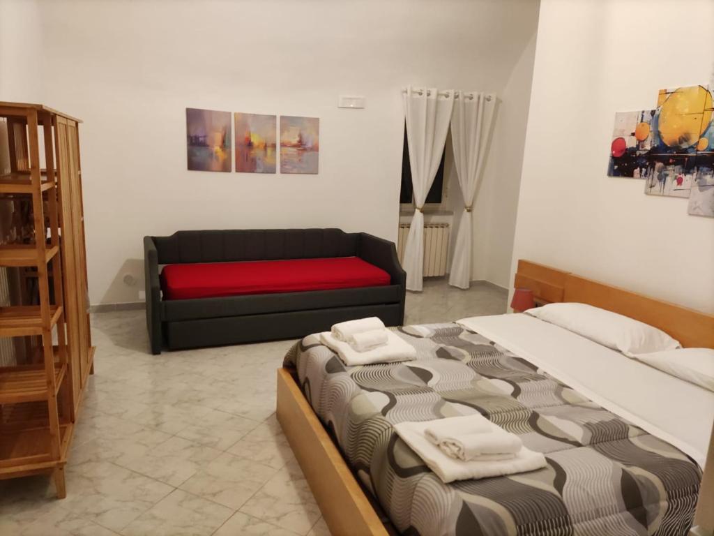 A bed or beds in a room at Il Cortile