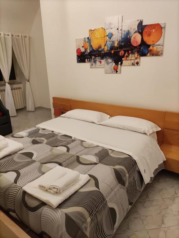 A bed or beds in a room at Il Cortile
