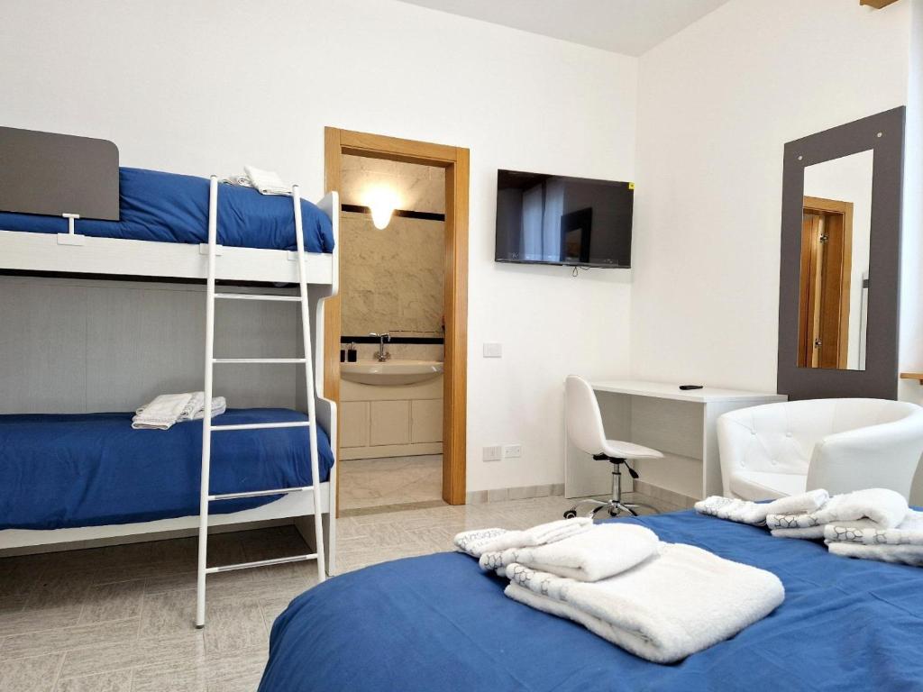 Postel nebo postele na pokoji v ubytování Iris B&B Verona