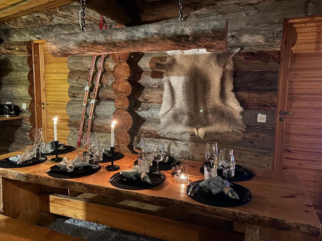 a table set up for a meal in a cabin at Villa Angie Ruka in Ruka