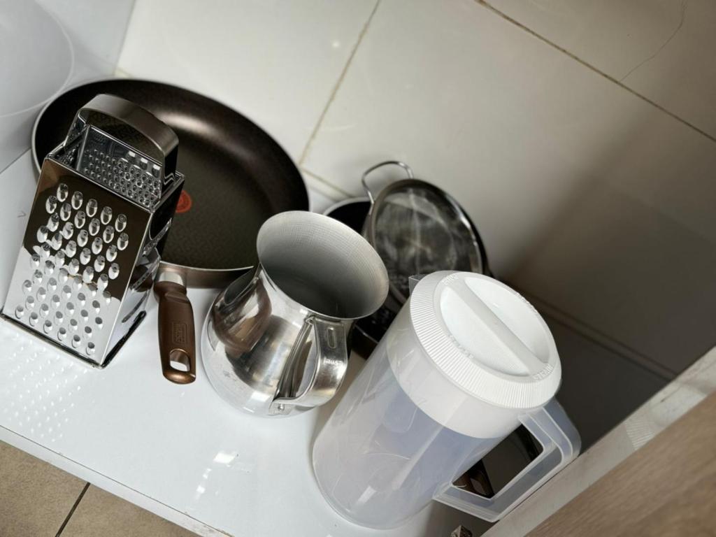 Příslušenství pro přípravu čaje a kávy v ubytování Hostelfc Chapinero