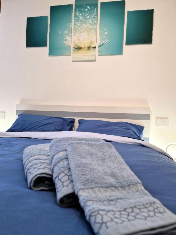 Postel nebo postele na pokoji v ubytování Iris B&B Verona