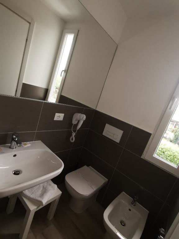 Koupelna v ubytování Hotel Sonia