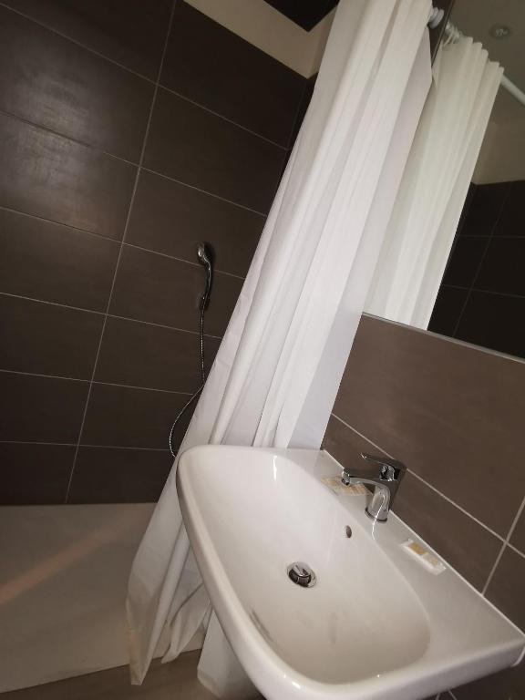 Koupelna v ubytování Hotel Sonia