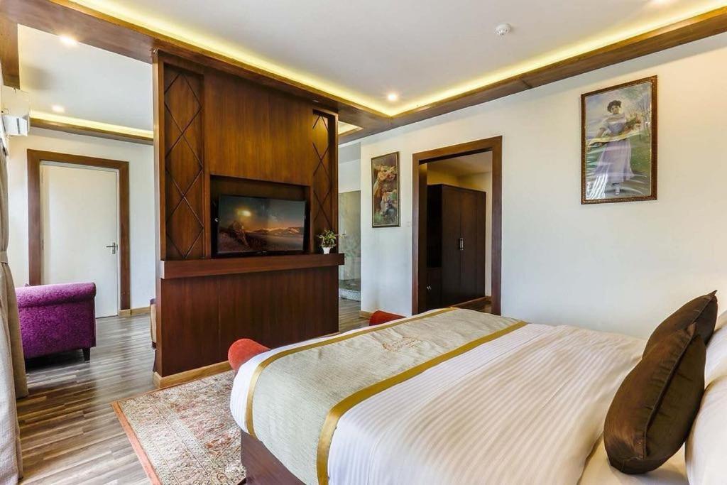 Postel nebo postele na pokoji v ubytování Hotel Ichchha