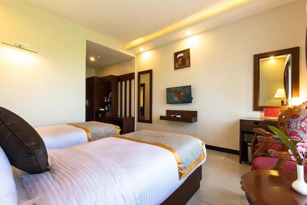 Postel nebo postele na pokoji v ubytování Hotel Ichchha