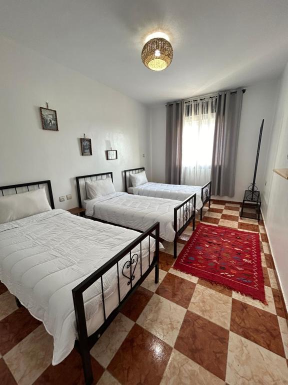 Letto o letti in una camera di Hotel Al Manar