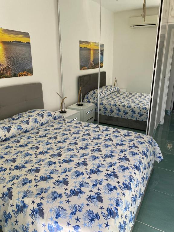 Postel nebo postele na pokoji v ubytování Ponzamania Diamante sul mare