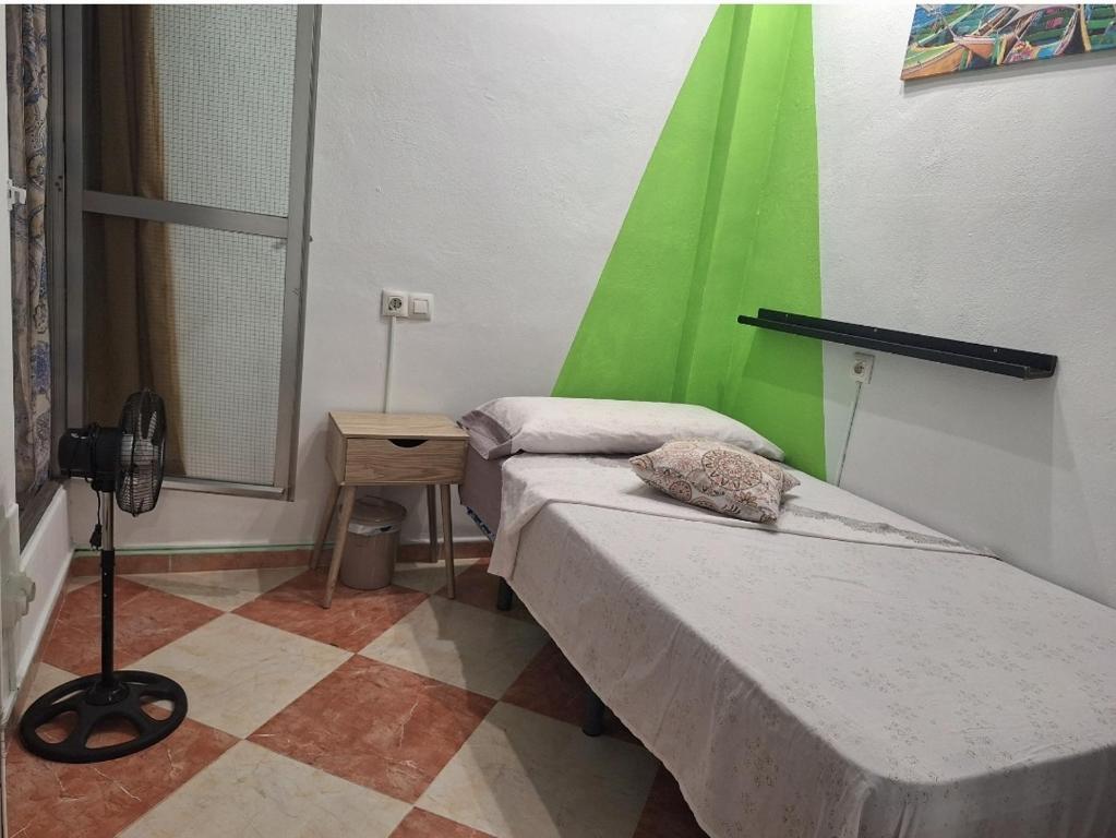 Posteľ alebo postele v izbe v ubytovaní Ikigai House