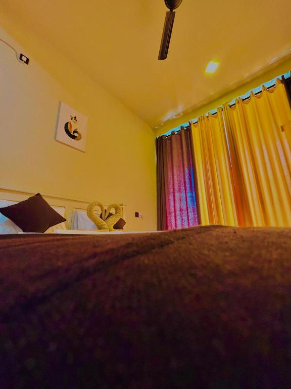 Postel nebo postele na pokoji v ubytování Crystal Resort