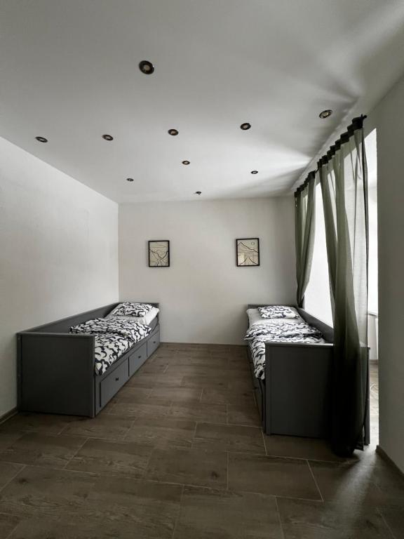 Postel nebo postele na pokoji v ubytování Apartmán Hájovna