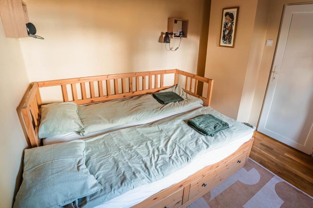 Postel nebo postele na pokoji v ubytování Molnárkalács vendégház