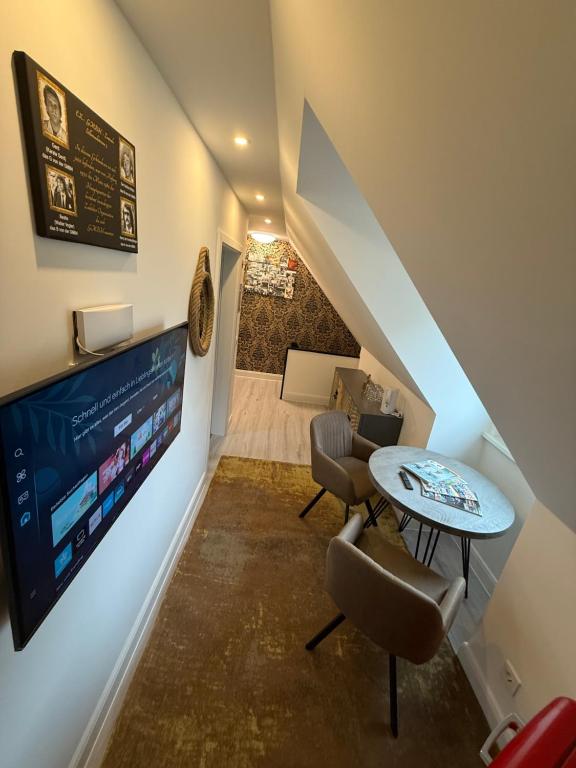 TV a/nebo společenská místnost v ubytování Loft Residence St Pauli, Harbour & Schanze